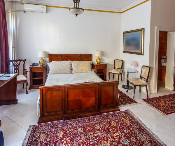 hotel-room-with-furnishings-and-decorative-rugs-2026-03-26-04-03-59-utc
