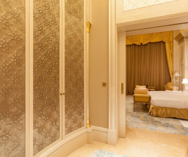 luxury-wardrobe-room-with-a-glimpse-of-the-bedroom-2026-03-24-12-53-25-utc